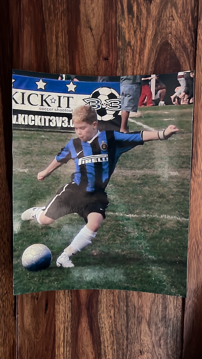Chris Mueller playing soccer as a child before his professional career